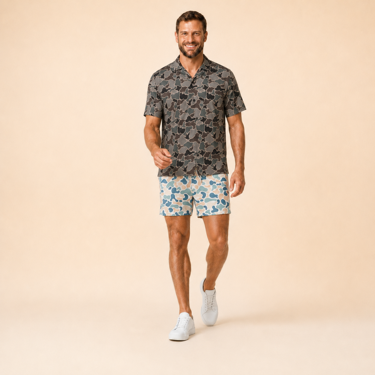 Man wearing Silpaz duck camo athletic shorts in cream blue camo, walking pose
