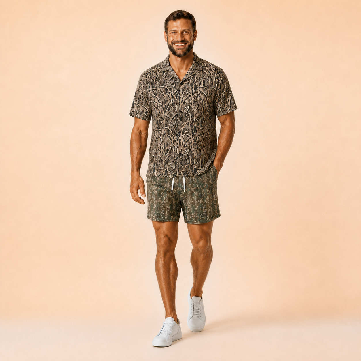 Man wearing Silpaz tree bark camo mesh shorts in Green Leaf Camo with a matching camp shirt, full length front view
