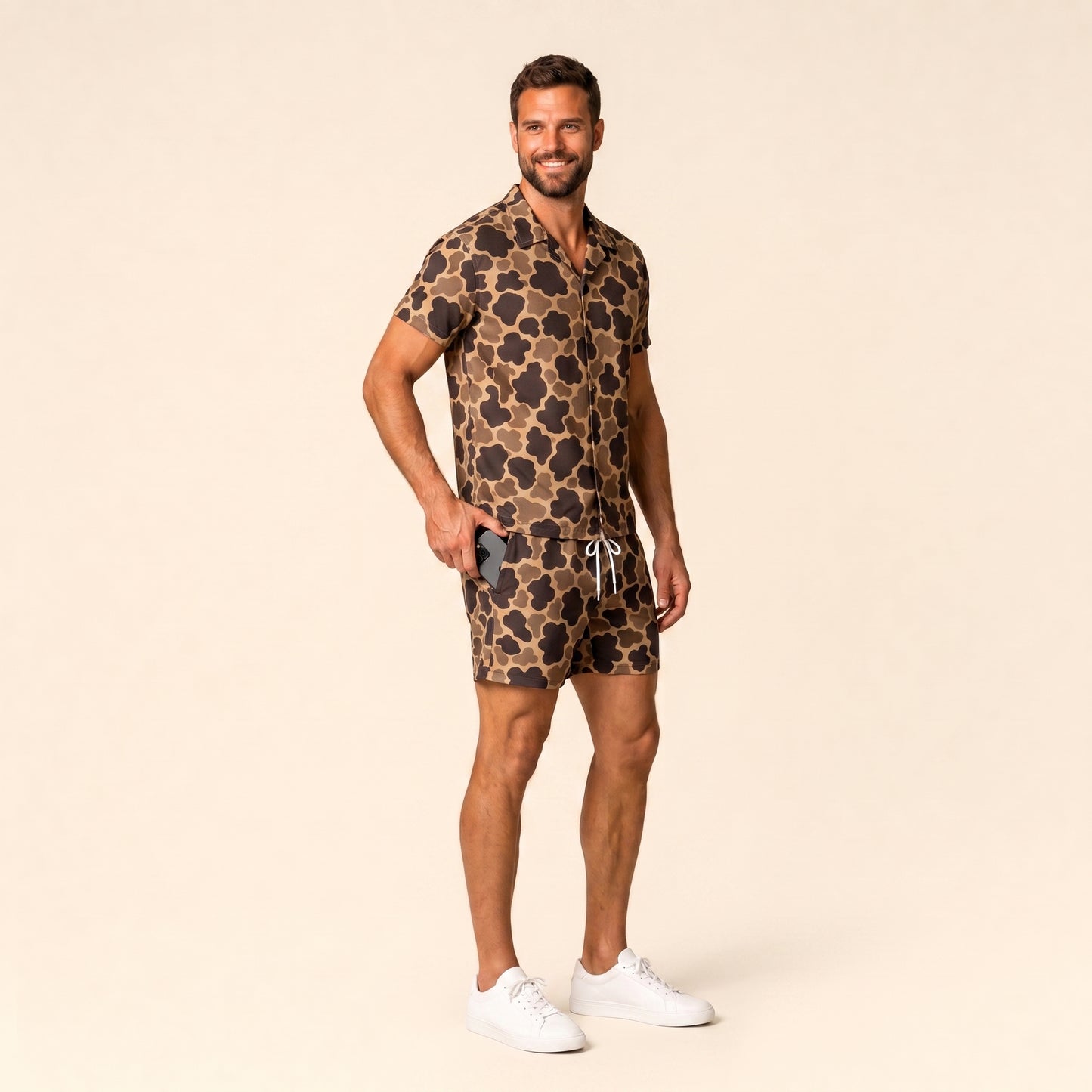 Silpaz Men's Vintage Duck Camo Shorts - three quarter side view, phone sliding into side pocket