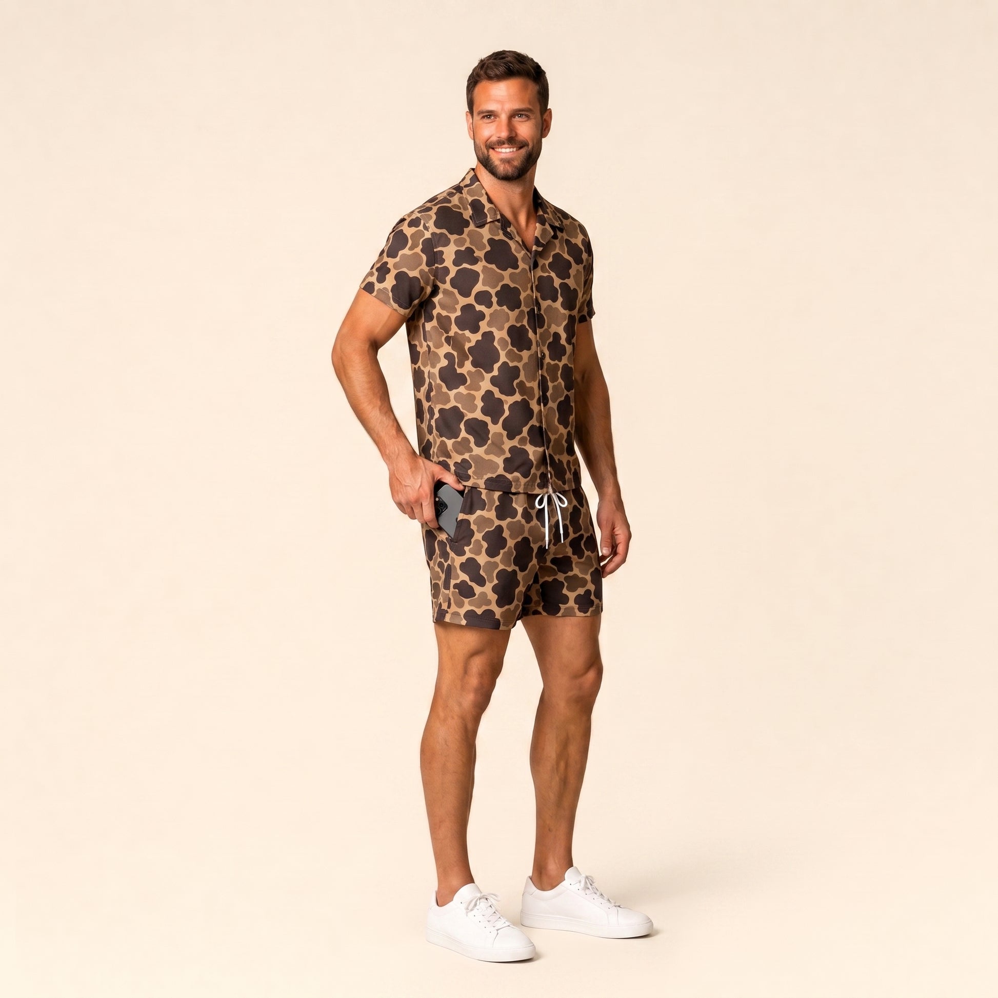 Silpaz Men's Vintage Duck Camo Shorts - three quarter side view, phone sliding into side pocket