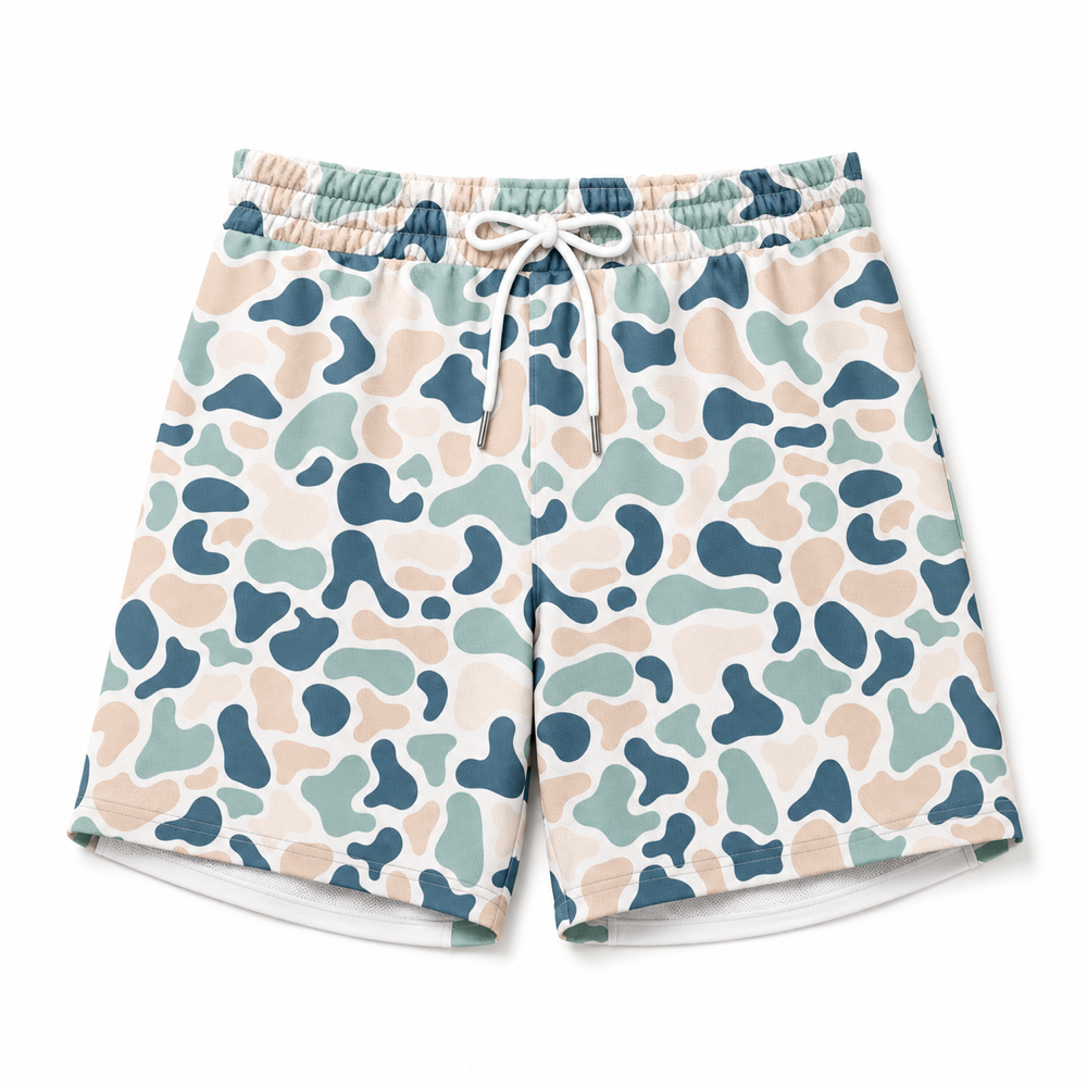 Silpaz men's cream blue camo athletic shorts flat lay on a clean white background