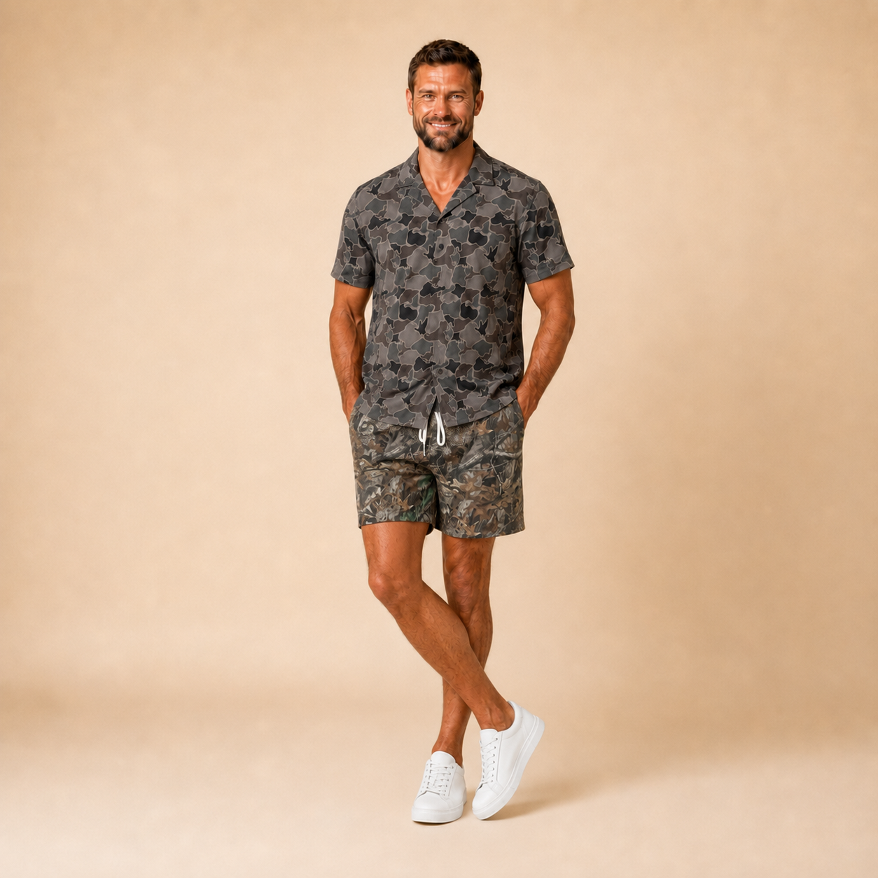 Man wearing Silpaz duck camo sport shorts in tan camo, walking pose